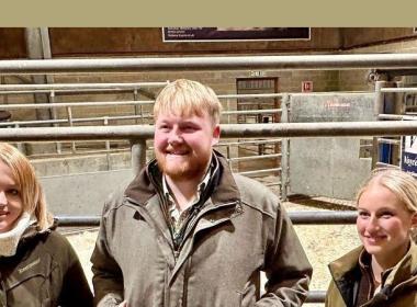 kaleb cooper and two rau bursary winners at teh cattle market