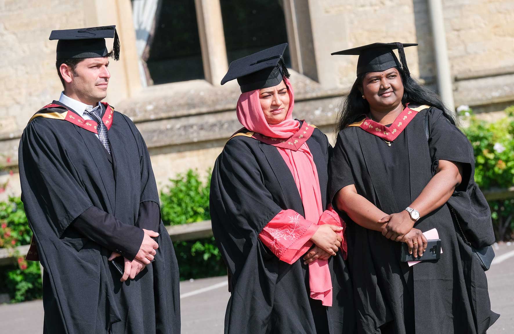 Three graduating students