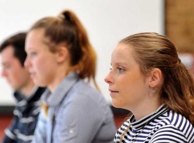 Students looking at computers