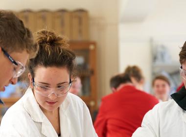 Three students in a laboratory